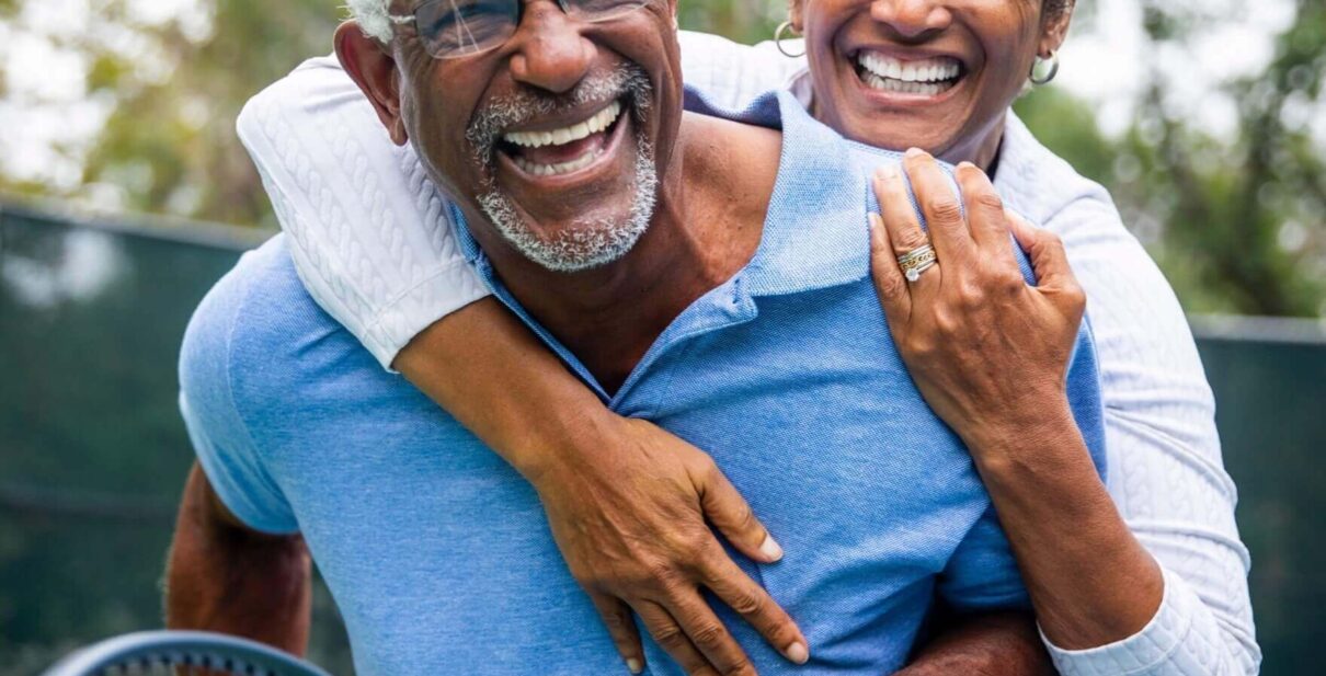 Happy tennis couple