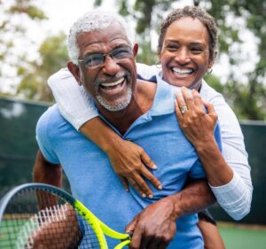 Happy tennis couple