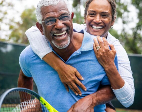 Happy tennis couple