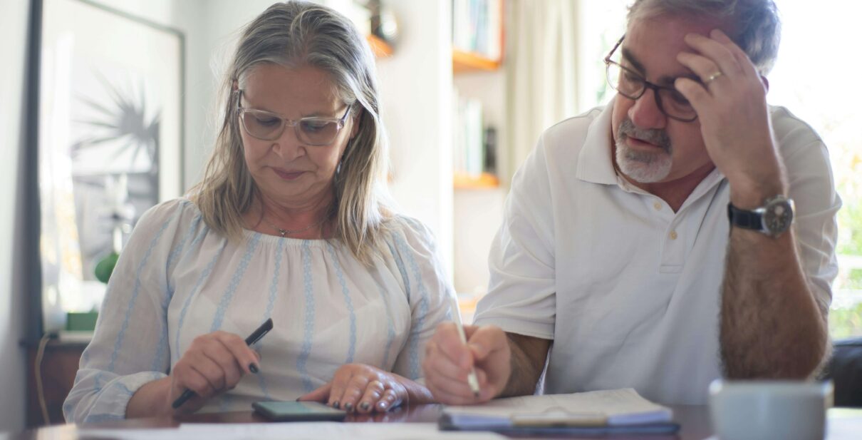 Couple preparing checklist