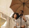 Black couple with umbrella