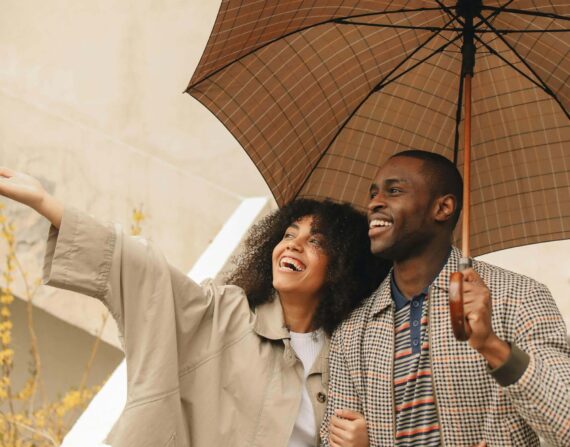 Black couple with umbrella