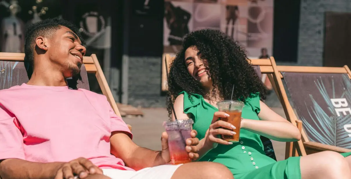 Couples at the beach discussing life insurance