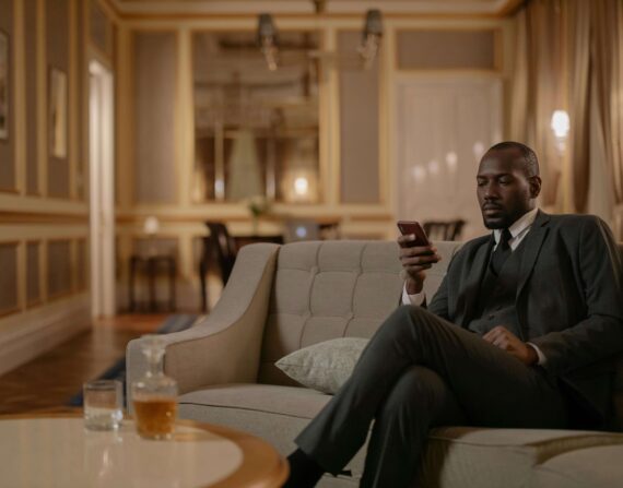 Wealthy man sitting on the couch